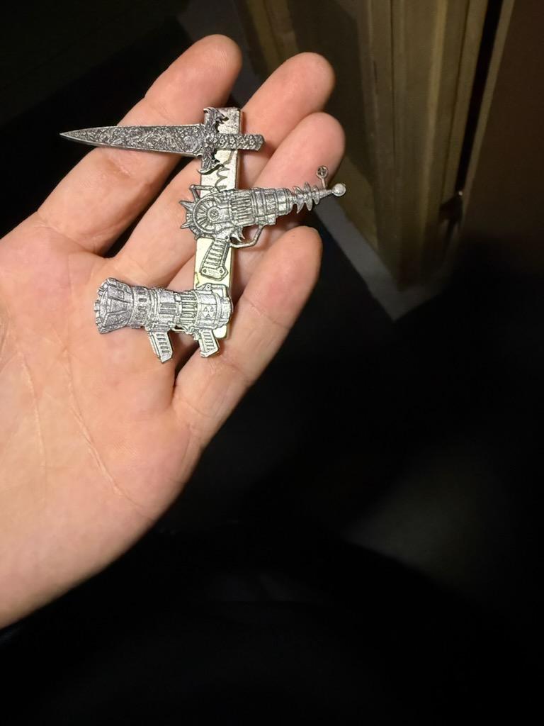 Weapons pendant engraving